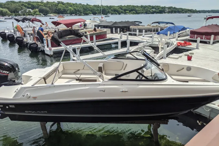 a boat parked next to a body of water