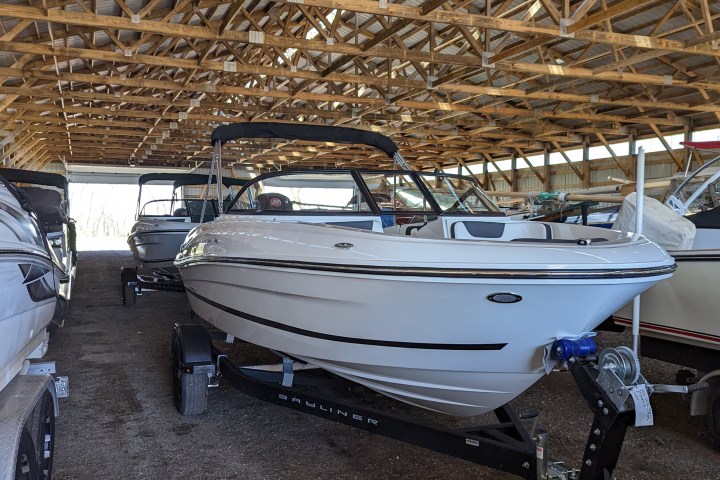 a boat filled with logs