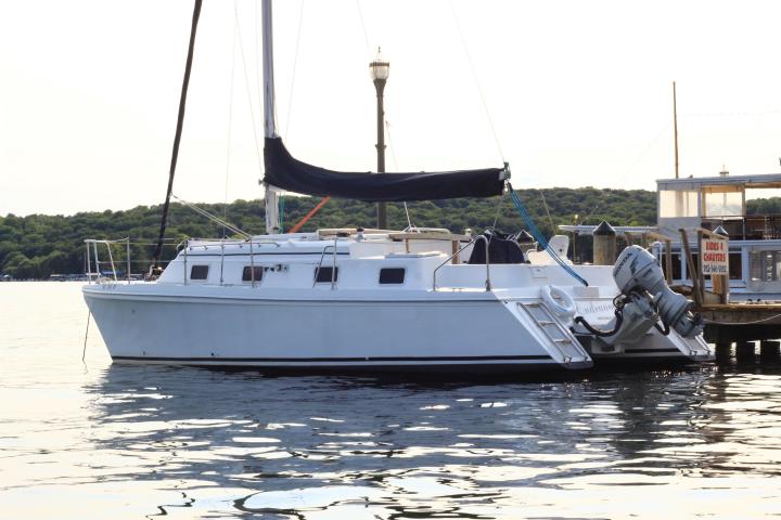 a small boat in a large body of water