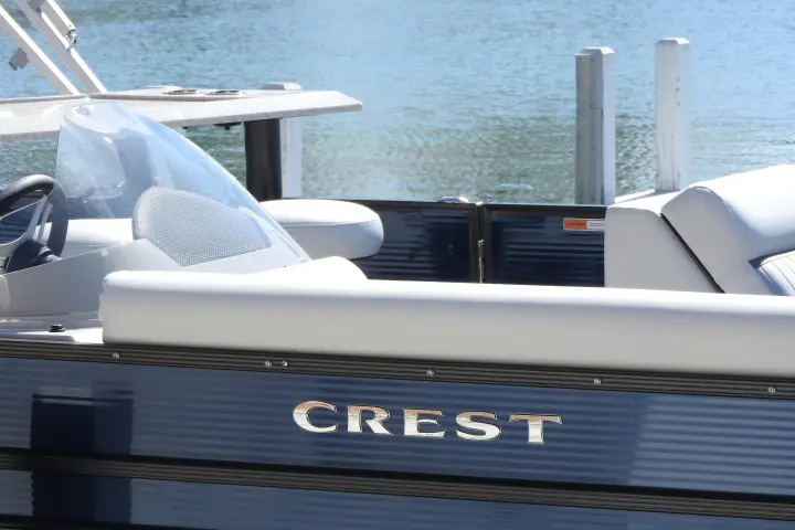 a boat sitting next to a body of water