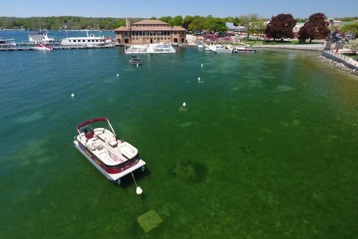 a small boat in a body of water