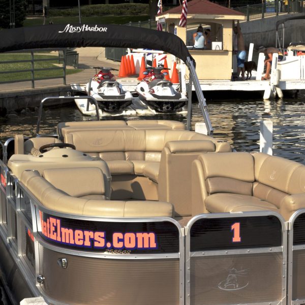 a train is parked on the side of a building