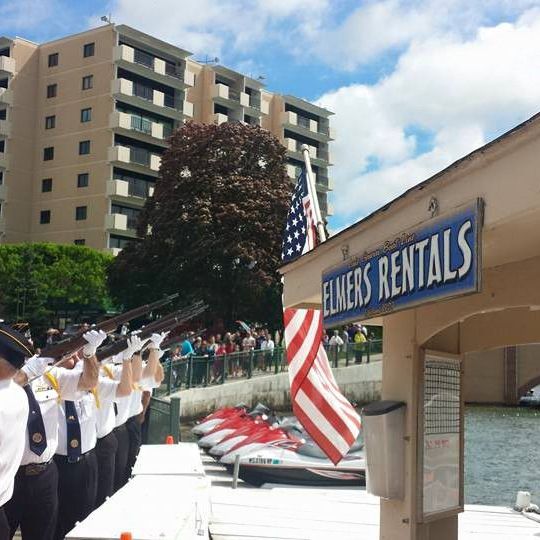 a group of people standing in front of a building